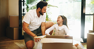 Buy stock photo Box, moving in or unpacking with dad and daughter in new home for property or real estate investment. Growth, happy or relocation with single parent man and girl child in apartment for mortgage