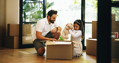 Buy stock photo Packing, box and girl with father for moving, property relocation or smile in new home. Child, kid and dad with package for mortgage, real estate loan or help for unboxing belongings in dream house