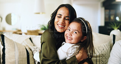 Buy stock photo Smile, hug and love with mother and daughter on sofa for bonding, support and trust. Happiness, relax and connection with woman and girl in living room of family home for care, comfort and embrace