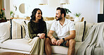 Couple, happy and relax on sofa in home with security, support and relationship connection. Love, people and smile in living room with conversation, marriage commitment and bonding together with care