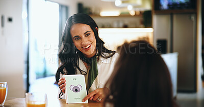 Buy stock photo Animal, cards or education with mother and daughter in dining room of home together. Development, learning or sound with girl child and single parent woman in apartment for language assignment
