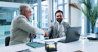 Buy stock photo Business men, smile and handshake in office for merger, partnership or acquisition. Laptop, team or shaking hands for collaboration with company buyer for investment deal, share purchase or agreement