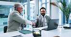 Business men, smile and handshake in office for merger, partnership or acquisition. Laptop, team or shaking hands for collaboration with company buyer for investment deal, share purchase or agreement