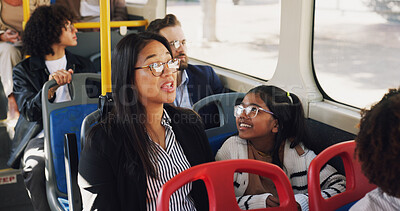 Buy stock photo Travel, mom and daughter in bus, talking and commuting in morning, smile and public transport in city. Happy, woman and child in vehicle for journey, family and bonding with conversation on trip