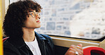 Thinking, man and window on bus in city for travel, public transport and view for sightseeing. Person, passenger and daydreaming on vehicle for trip, urban journey and morning commute for destination