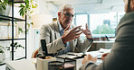 Businessman, executive and discussion with client for b2b, meeting or negotiation at office desk. Mature man, CEO or corporate investor talking with partner for chat, business campaign or development