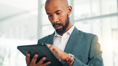 Buy stock photo Planning, research and tablet with business black man in office for information, project management report. Digital app, reading and review with corporate professional in workplace for development