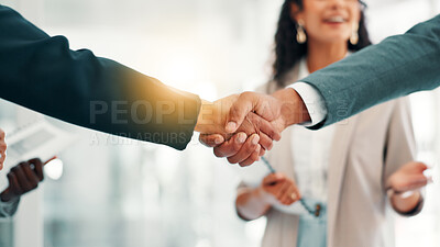 Buy stock photo Business people, handshake or meeting with partnership for introduction, B2B or deal together at office. Closeup, employee or colleagues shaking hands with lens flare for agreement or job opportunity