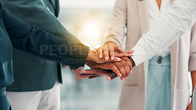 Buy stock photo Business people, meeting and hands together with team for motivation, mission or inclusion at office. Closeup, group or employees piling with stack in huddle for unity, collaboration or cooperation