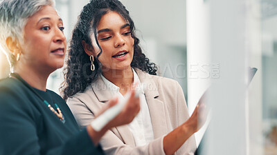 Buy stock photo Feedback, manager and women with tablet, talking and collaboration for marketing strategy on website. Meeting, mature CEO and people with tech for project, teamwork and brainstorming in business