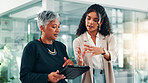Document, tablet and business women in office for project, planning and collaboration. Professional, teamwork and meeting for mentor advice with digital tech for online report, research and website
