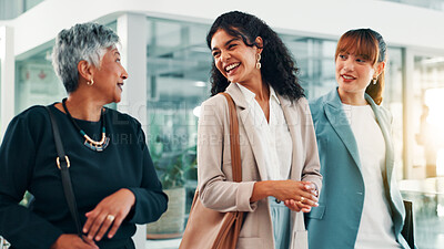 Buy stock photo Business women, lobby and walk in office with laughing for corporate joke or commute at workplace. Employees, coworkers and travel with collaboration, team building or conversation for management