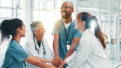 Buy stock photo Hands stack, doctors and people in hospital, smile and support with team building. Group, medical and professional in clinic, gesture and celebration for research funding, healthcare and motivation