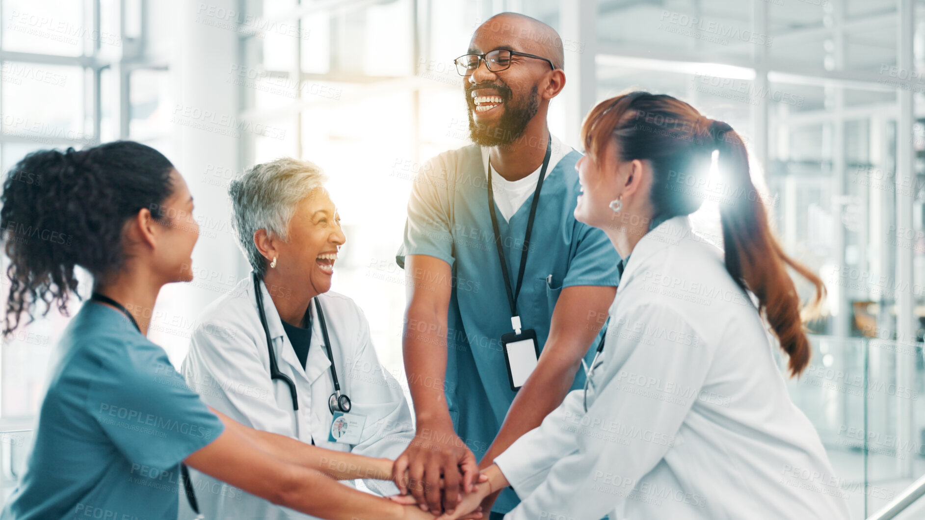 Buy stock photo Hands stack, doctors and people in hospital, smile and support with team building. Group, medical and professional in clinic, gesture and celebration for research funding, healthcare and motivation