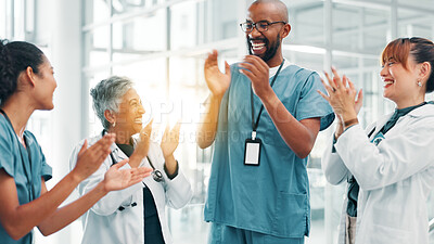 Buy stock photo Man, doctors and team with applause, celebration and happy for promotion, goals and good service at clinic. Women, group and medical staff with cheers, praise and support for success at hospital
