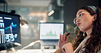 Woman, trading and computer with thinking, graphs and pen for review, results or monitor for stocks at office. Person, decision and crypto investor at night by screen, value or market stats at agency
