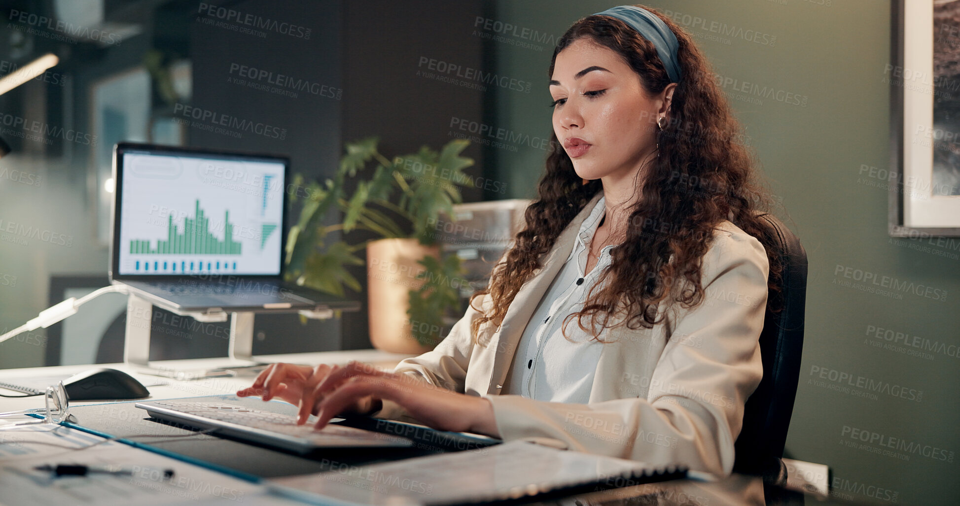 Buy stock photo Woman, typing and computer with finance, charts and review for revenue report in office at company. Person, keyboard and statistics at night, graphs and research with info for stock market at agency