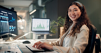 Buy stock photo Woman, trading and computer with portrait for charts, smile for review, typing or monitor for stocks at office. Person, happy and crypto investor at night by screen, value or market stats in Mexico