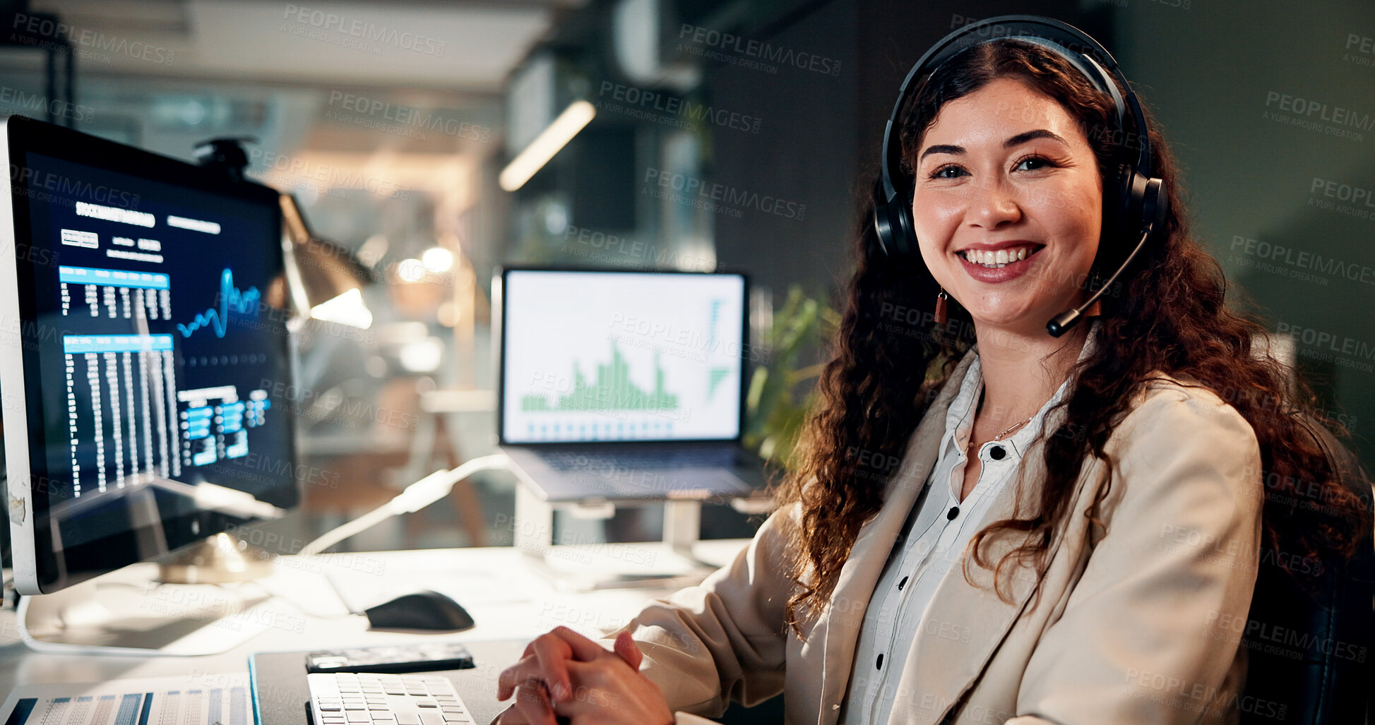 Buy stock photo Woman, trading and charts with headset in portrait, smile and pride for career by monitor for stocks at office. Person, voip and crypto investor at night by screen, value or market stats in Mexico