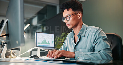 Buy stock photo Man, typing and computer with trading, graphs and review for revenue report in office at company. Person, keyboard and statistics at night, charts and research with info for stock market at agency