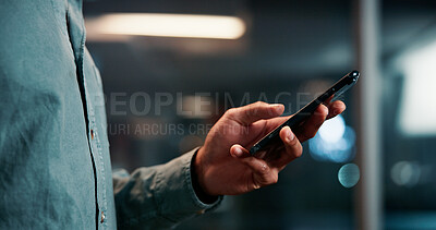 Buy stock photo Businessman, hands and phone in office at night for online trading account, checking share price or stocks research. Trader, closeup and smartphone for portfolio management, overtime or digital stats