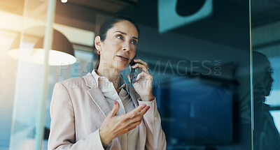 Buy stock photo Phone call, business and woman in office by window for discussion, corporate meeting and planning. Professional, finance consultant and person on smartphone for contact, communication and talking