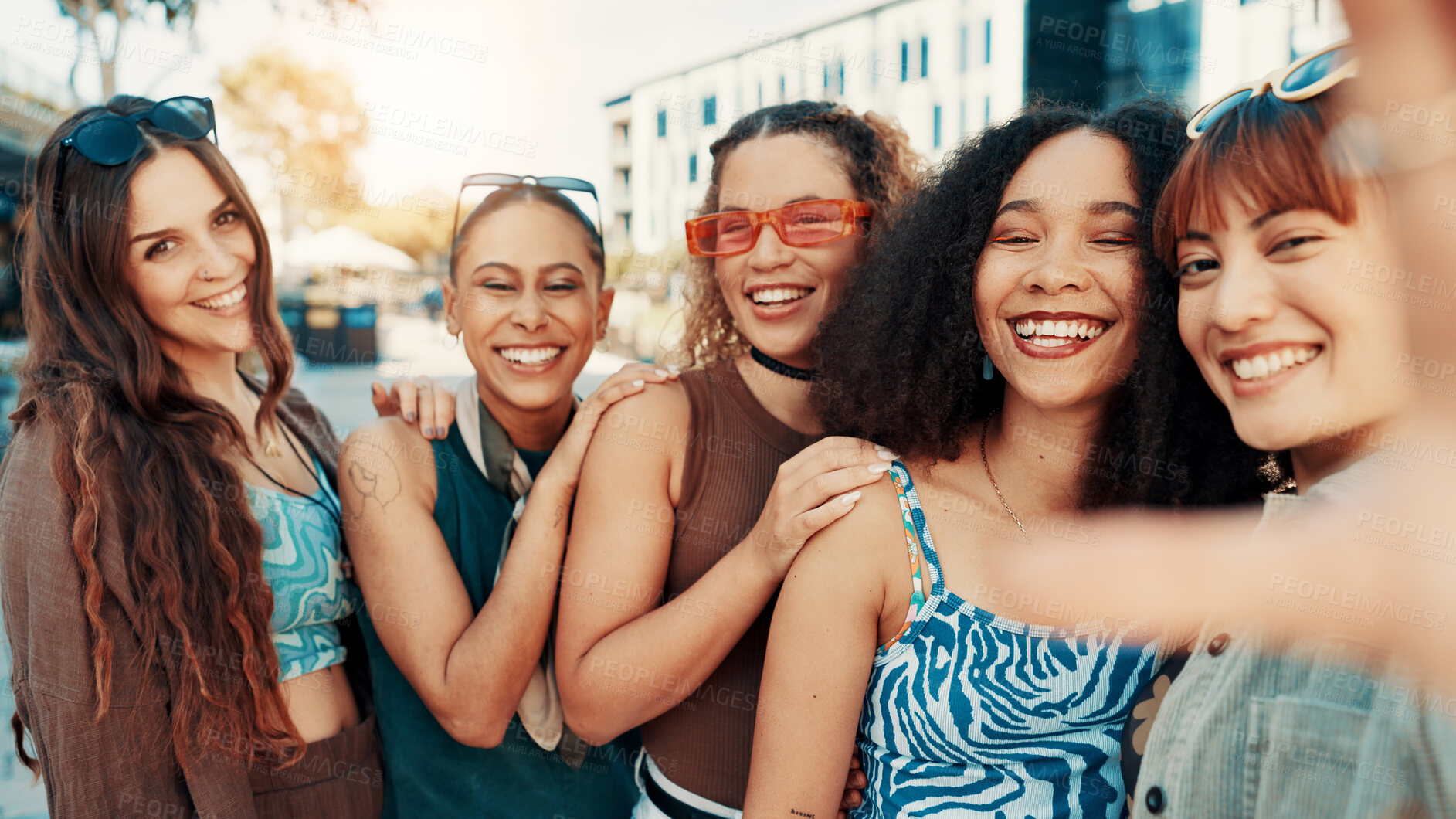 Buy stock photo Girl, selfie and smile with group in city, portrait or bonding with streetwear for fashion in summer. Gen z women, friends and happy with photography, memory or trendy style for social media in town