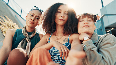 Buy stock photo Selfie, people and women with fashion, below and diversity with urban town, support and gen z. Profile picture, friends and group in street, low angle and female empowerment with stylish clothes