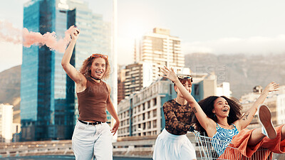 Buy stock photo Friends, running or trolley in city laughing for funny adventure, playing and bonding on sidewalk. Excited, color smoke or women pushing cart in urban town with freedom, confidence and weekend break
