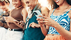 City, hands and group of friends with smartphone, gen z fashion or online application for gossip. Urban, cool style and women in row with technology for network, social media or chat on internet post