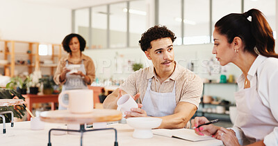 Buy stock photo Pottery, class and people with clay in workshop for teaching, learning and skills development. Creative, studio and man and woman with ceramic mold for design, sculpture and DIY hobby in art lesson