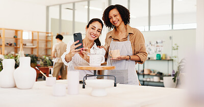 Buy stock photo Pottery class, selfie and women in ceramic workshop with online post, achievement and clay product. Phone, social media or mentor in studio with support, feedback and sculpture design mold or smile