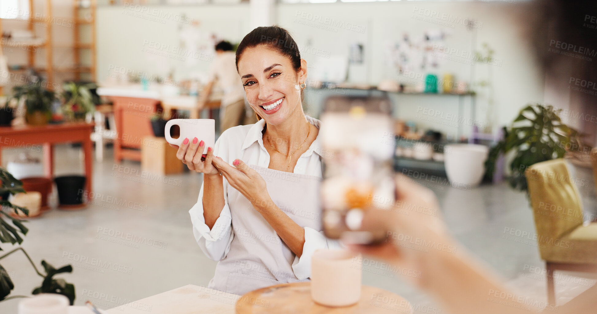 Buy stock photo Pottery class, photo and woman in ceramic workshop with online post, achievement and clay product. Phone, social media and person in studio with friend, feedback and sculpture design mold or smile