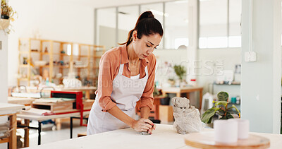 Buy stock photo Pottery, designer and woman in workshop with clay for design, sculpture and learning skills in studio. Creative, startup and person with ceramic object for DIY hobby, craft and handmade product
