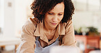 Home, serious and woman with apron, kitchen and planning for meal in morning, thinking or preparing. House, chef and person with culinary skills for small business, entrepreneur or ideas for catering