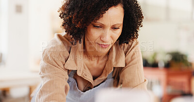 Buy stock photo Home, serious and woman with apron, kitchen and planning for meal in morning, thinking or preparing. House, chef and person with culinary skills for small business, entrepreneur or ideas for catering