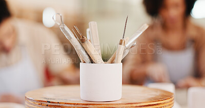 Buy stock photo Pottery, art and tools in workshop for process, sculpture design and learning artwork. Closeup, people and artistic equipment for craft production, handmade hobby and creative lesson in ceramic class