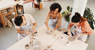 Buy stock photo Pottery class, above and people in workshop, conversation and learning with clay manufacturing. Business owner, artist and ceramic retail store with material, talking or art product with technique