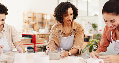 Buy stock photo Pottery class, clay and people in workshop, conversation and help with sculpture mold. Business owner, artist and ceramic retail store with advice, talking or learning manufacturing with technique