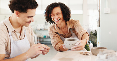 Buy stock photo Pottery class, friends and people in ceramic workshop with laugh, achievement and clay product joke. Funny, process and man with woman in studio with support, feedback and sculpture design or smile