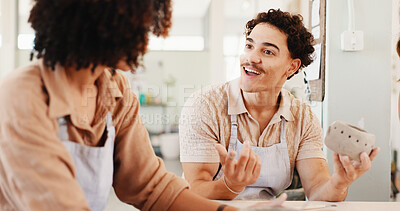 Buy stock photo Pottery class, friends and people in workshop with creative, designer and ceramic clay product. Employee, process and man with woman in studio with support, feedback and sculpture design or smile