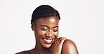 Makeup, shine or black woman with smile for beauty, portrait or acne solution on white background. Studio space, face or happy African model with confidence for foundation, skincare mockup or glow