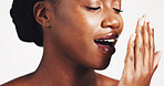 Black woman, hand and breathe check in studio for hygiene, dental healthcare and oral wellness. Female model, mouth breathing and inspection with smell for odor or plaque problem by white background