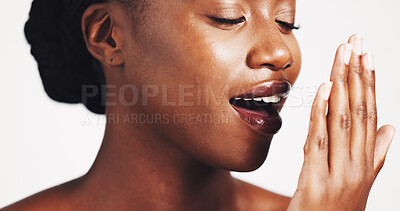 Buy stock photo Black woman, hand or breath check at studio for hygiene, dental health and oral wellness. Female model, mouth breathing or inspection with smelling for scent and healthy teeth by white background