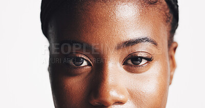Buy stock photo Eye, lashes and beauty with portrait of black woman in studio for makeup, mascara and skincare. Glow, shine and aesthetic with closeup of person on white background for cosmetics and self care