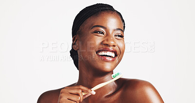 Buy stock photo Toothbrush, dental hygiene and happy black woman in studio for wellness, brushing teeth and cleaning. Space, whitening and face of person for oral care, health and grooming on white background