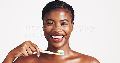 Buy stock photo Toothbrush, dental and portrait of black woman in studio for plaque, brushing teeth and cleaning. Space, mouth hygiene and face of person for oral care, whitening and grooming on white background