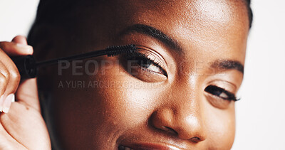 Buy stock photo Mascara, portrait or black woman with beauty, makeup or skincare glow in studio on white background. Cosmetics brush, application or confident girl model with eyelash extensions for volume or length 