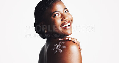 Buy stock photo Happy, black woman and shoulder with sunscreen for skincare in studio on a white background. Female person, model or smile with satisfaction for moisturizer, SPF protection or lotion on mockup space