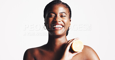 Buy stock photo Happy, black woman and portrait with lemon for vitamin C, skincare or detox on a white studio background. Female person, model or smile with citrus fruit for natural organic treatment on mockup space